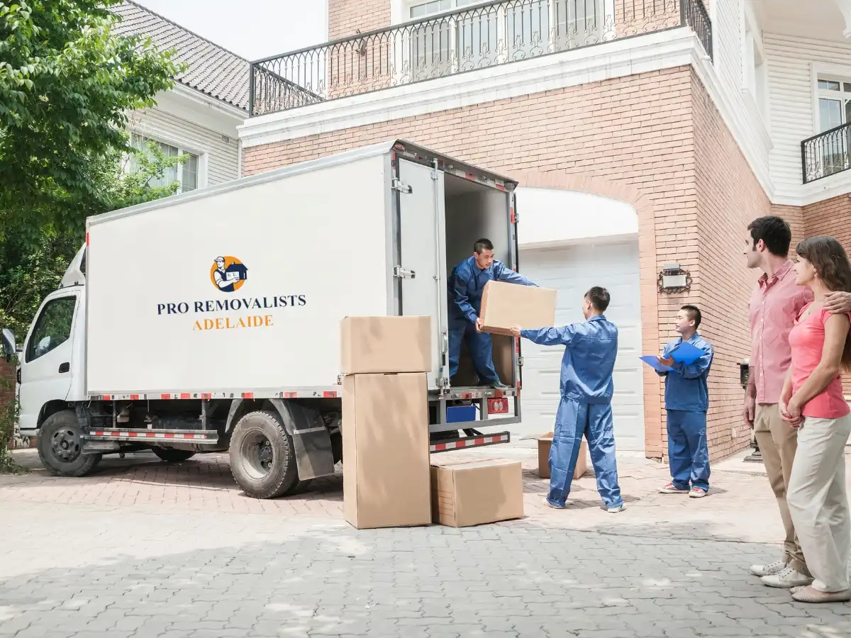 Expert Adelaide movers loading household items into a truck